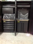 lot 114 image: Husky Heavy Duty Welded 156 in. W x 81 in. H x 24 in. D Steel Garage Cabinet Set in Black (8-Piece) large cabinets have some damage please review pictures as stock photo was used to display item retails for $$2300