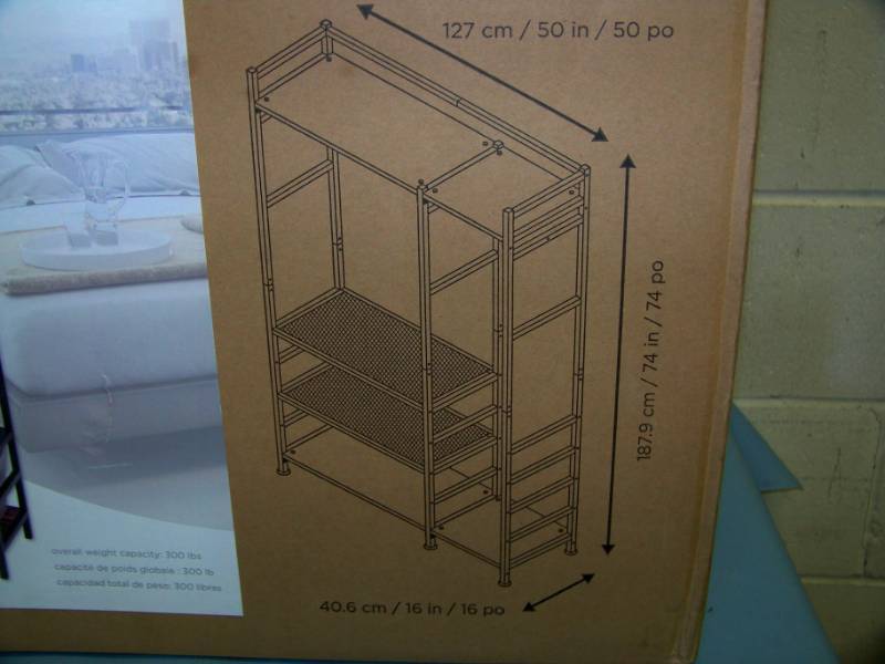 lot 11 image: neatfreak, Open Design Storage Closet - NEW in Original, Sealed Box