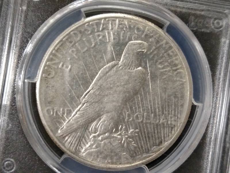 1928 PCGS AU58 Peace Silver Dollar,...