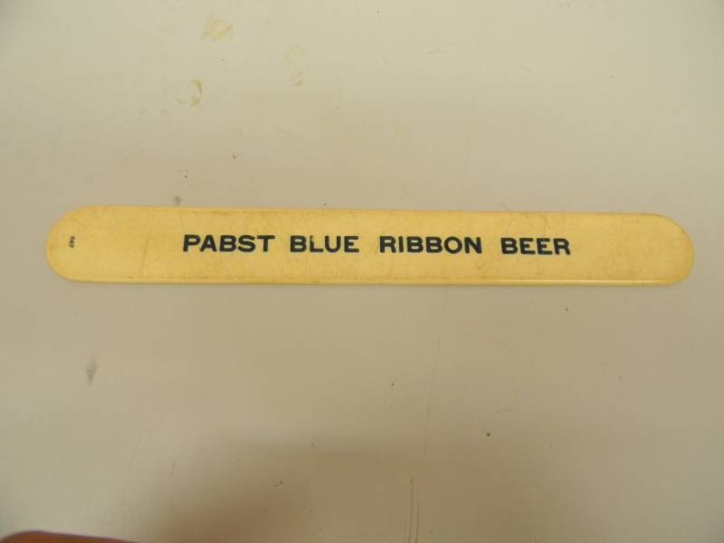lot 19 image: VINTAGE PABST BLUE RIBBON BEER FOAM SCRAPPER - RARE, GREAT COLLECTIBLE - SEE PICTURES