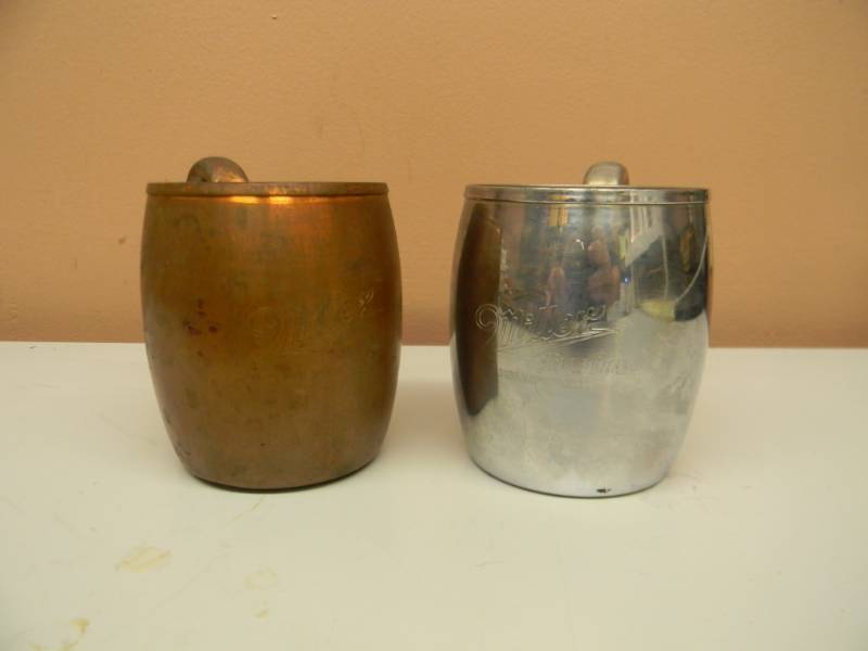 lot 59 image: 2 VINTAGE MILLER HIGH LIFE BEER MUGS - 1 SOLID COPPER WEST BEND MILLER HIGH LIFE MILWAUKEE MUG - 1 WEST BEND MILLER HIGH LIFE MILWAUKEE MUG - NICE SET - SEE PICTURES