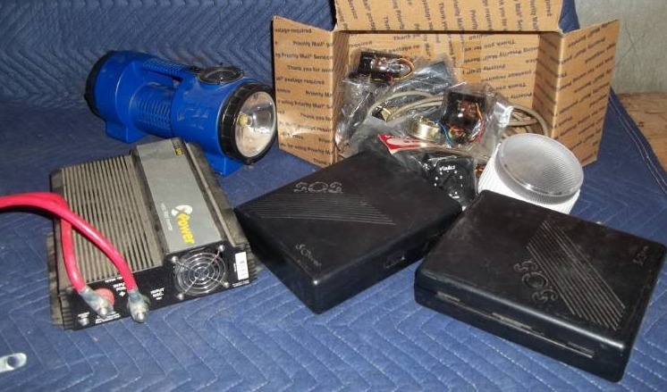 lot 59 image: CB Radio, Power Inverter, and More