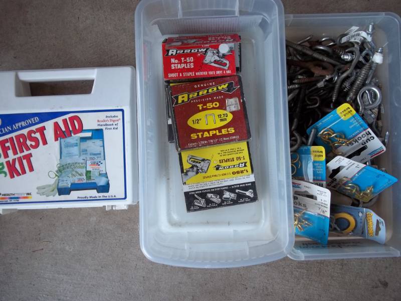 lot 213 image: Staples, Eye Hooks, and First Aid Kit