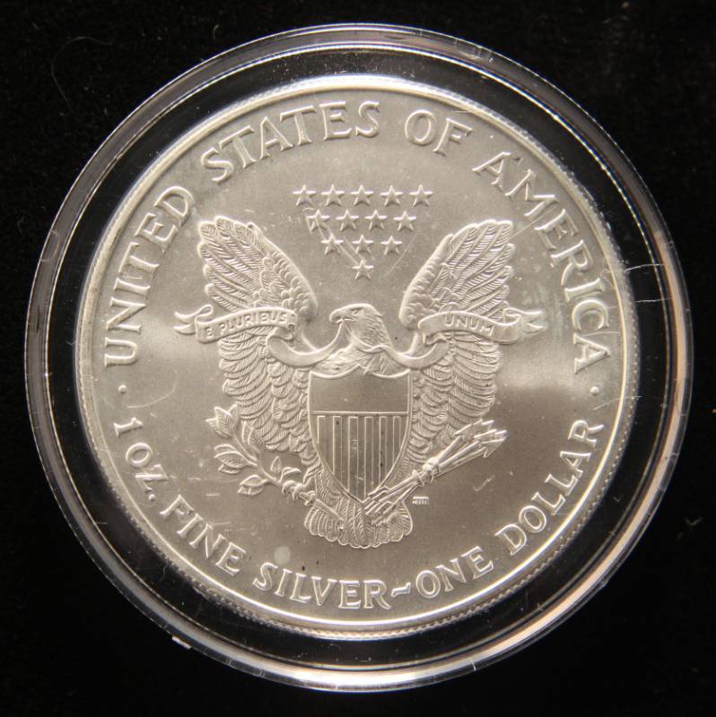 1999 COLORIZED AMERICAN SILVER EAGLE 1 TROY OZ. .999 FINE SILVER IN AIRTITE