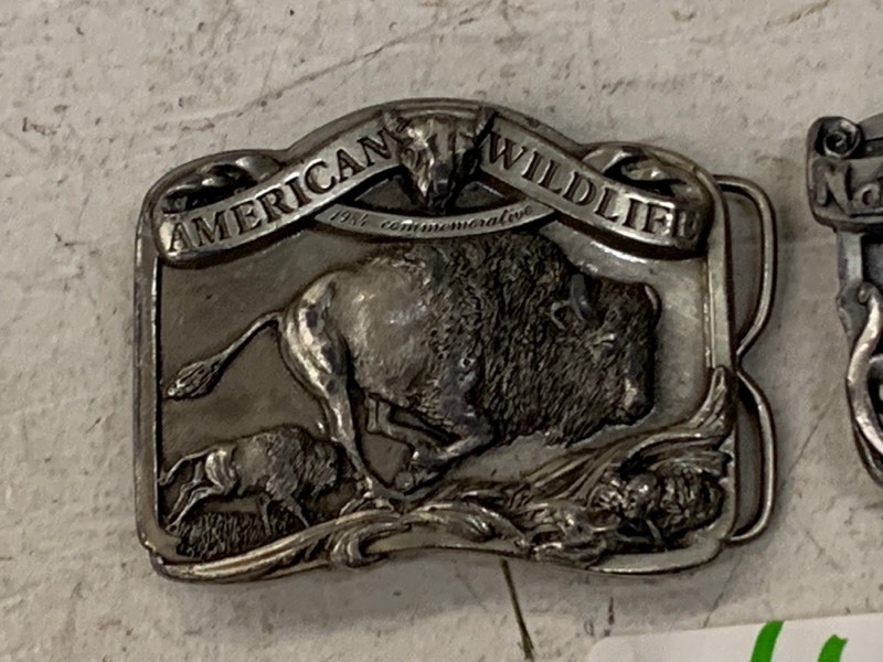 lot 66 image: (2) Limited Edition Belt Buckles