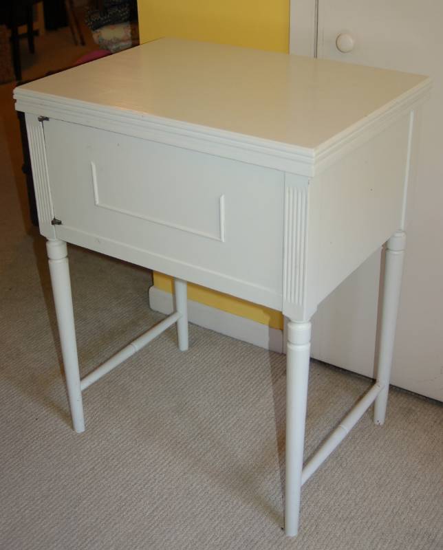 lot 32 image: Vintage Kenmore Sewing Machine with Cabinet