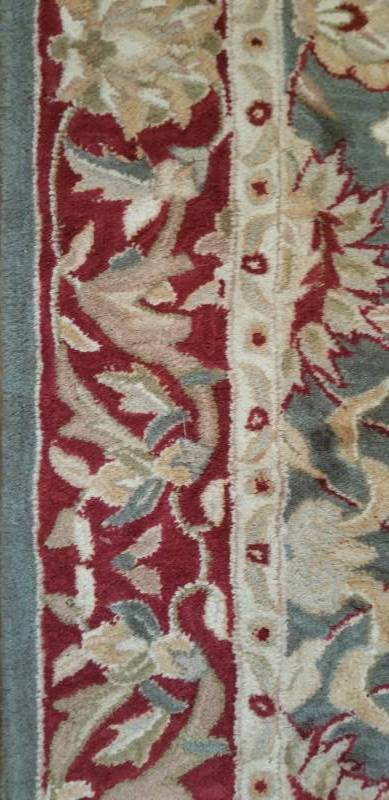 lot 17 image: Handmade Momeni Oriental Rug
