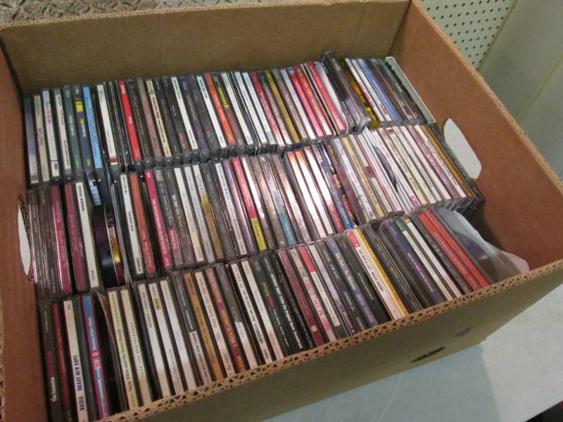 lot 18 image: Box Full of CDs  C-3...
