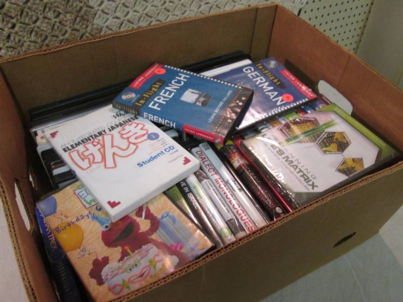 lot 25 image: Box of DVDs  C-3...
