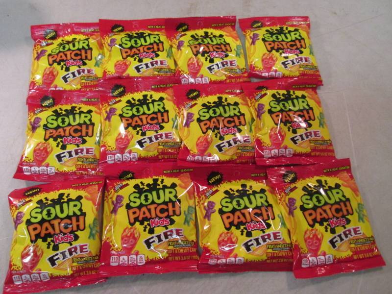 lot 51 image: 12 Bags of Sour Patch Kids Fire Bes...