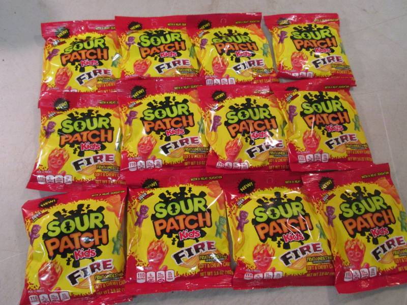 lot 53 image: 12 Bags of Sour Patch Kids Fire Bes...