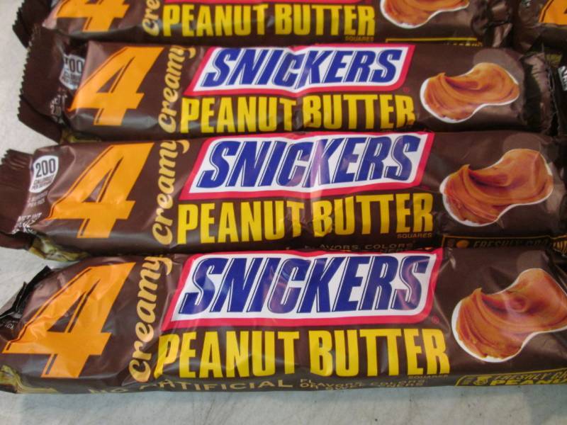 lot 101 image: 12 Snickers Creamy Peanut Butter Ca...