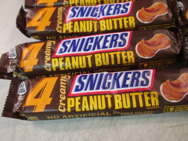 lot 102 image: 12 Snickers Creamy Peanut Butter Ca...