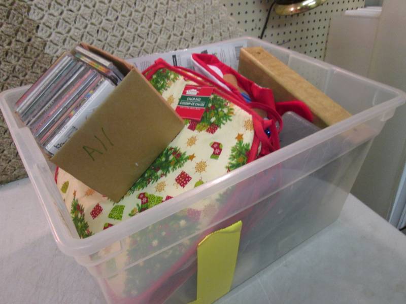 lot 110 image: Tote Full of Misc See Photos  D-2...
