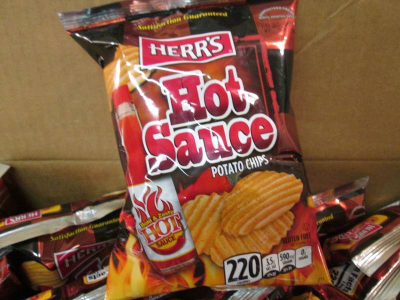 lot 156 image: Case of 30 Bags of Herrs Hot Sauce...
