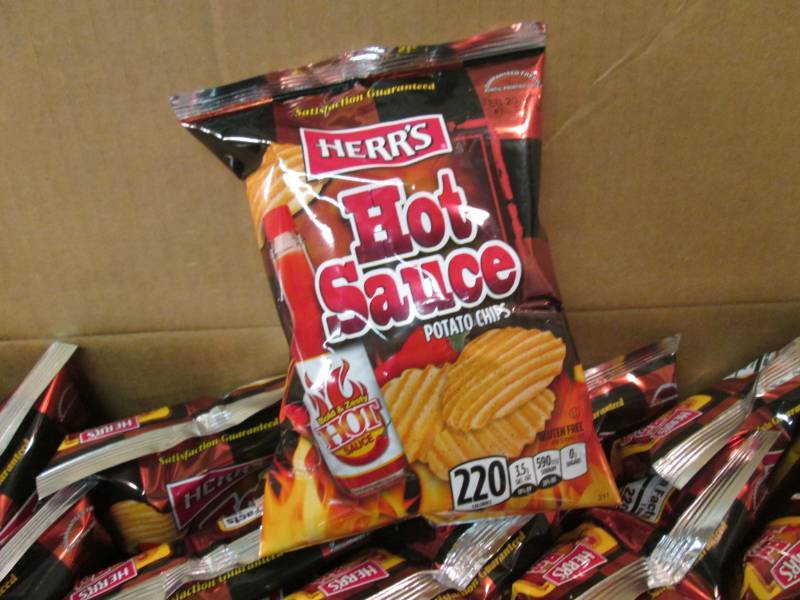 lot 160 image: Case of 30 Bags of Herrs Hot Sauce...