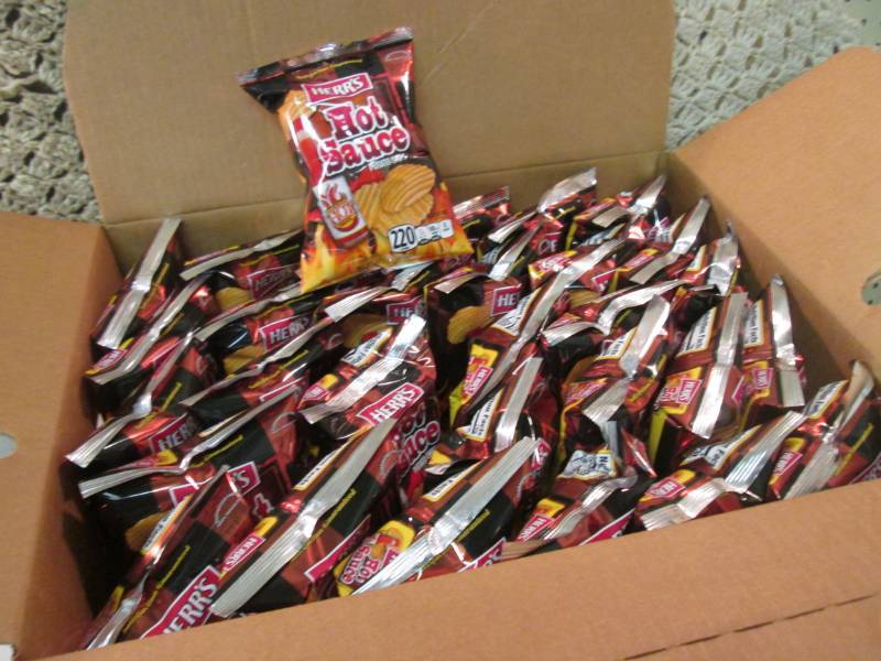 lot 161 image: Case of 30 Bags of Herrs Hot Sauce...