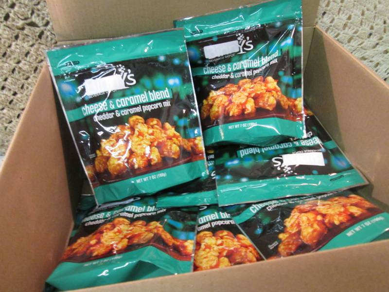 lot 169 image: Case of 12 Bags of Cheese & Caramel...