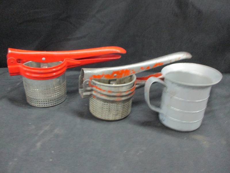 lot 129 image: Ricers and Measuring Cup