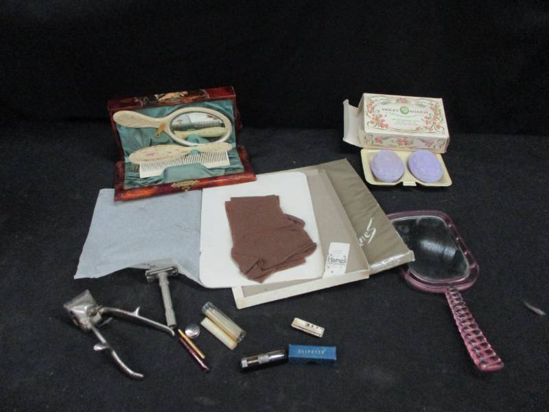 lot 141 image: Vintage Brush, Comb and Mirror Box, Old Mirror, Vintage Razors, Soaps, and Stockings