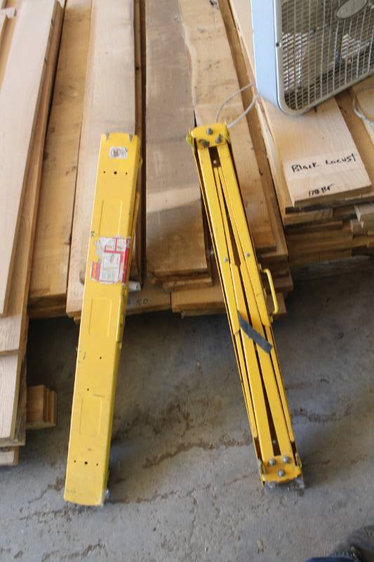 lot 579 image: Lot of (2) Adjustable Height Steel Sawhorses