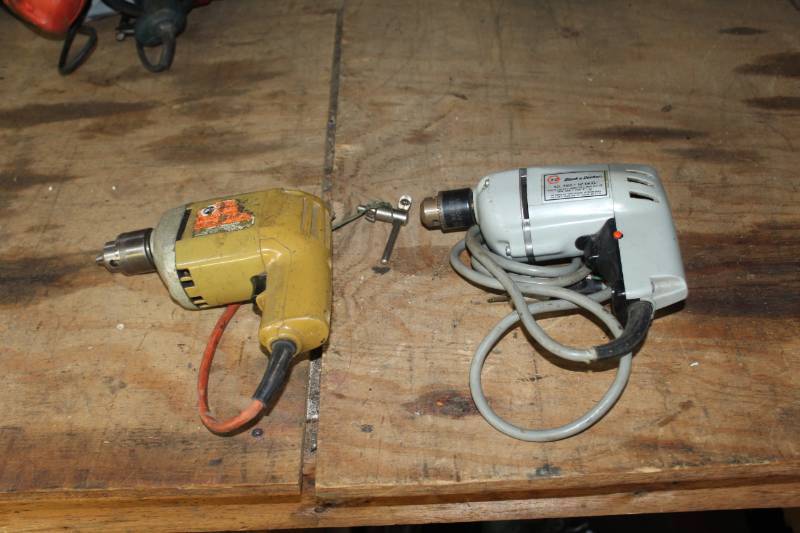 lot 210 image: Lot of (2) Black&Decker 14in. Drill 7004, 38in. Drill 7100