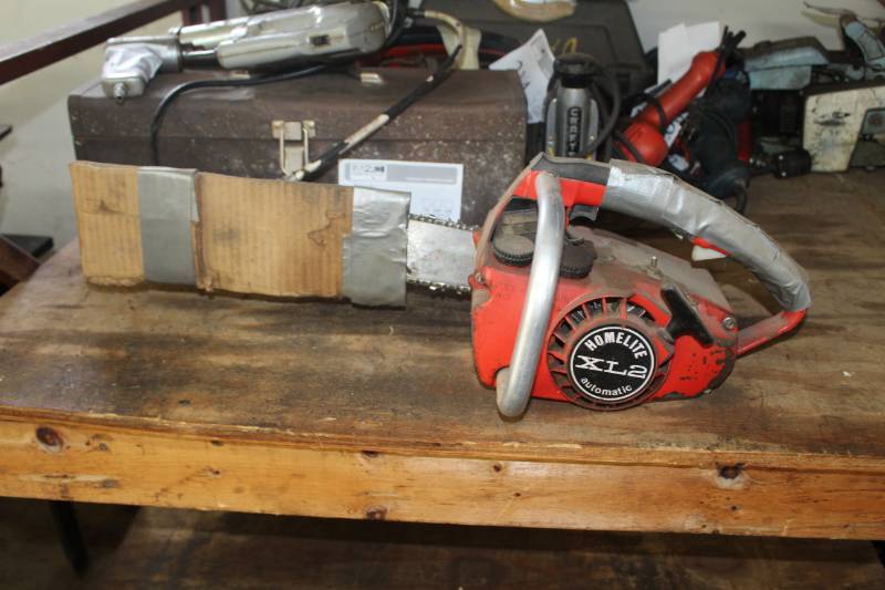 lot 212 image: Homelite XL2 Chainsaw