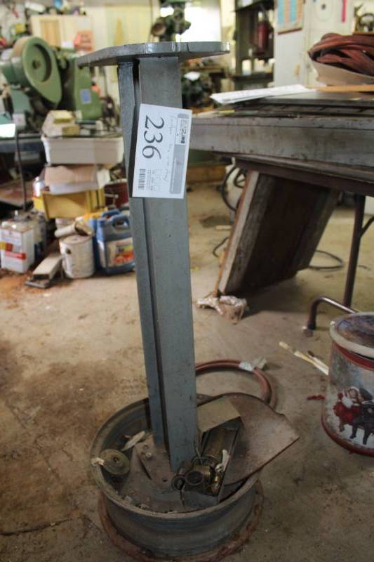lot 236 image: Custom Tire Rim Stand