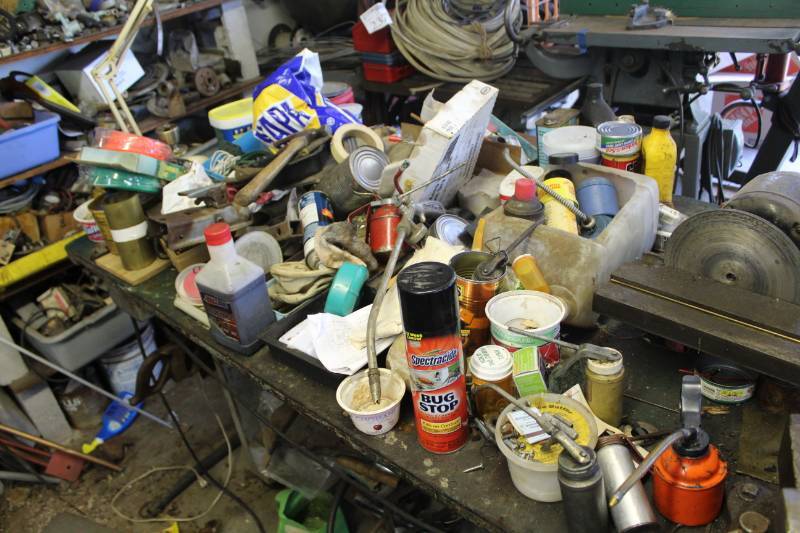 lot 275 image: Oil Cans, Hitch and Tongue, Weed Zip Line, Break-in Oil, Carbeuretor Parts, Hammer, Tape, And More
