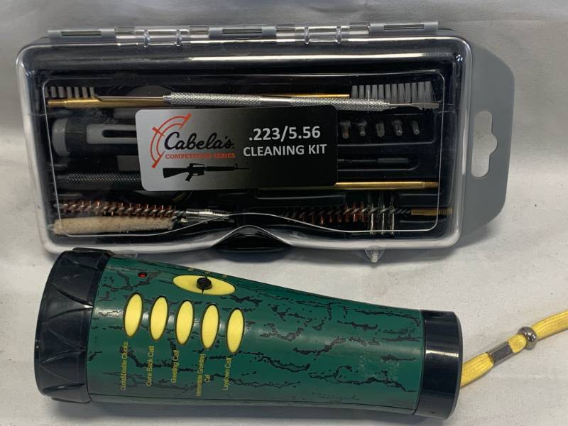 lot 55 image: Cabelas .223 Cleaning Kit & Animal Call
