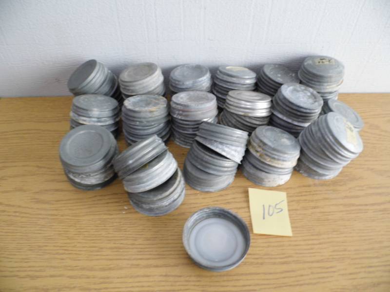 lot 105 image: Lot of 66 Antique Jar Lids