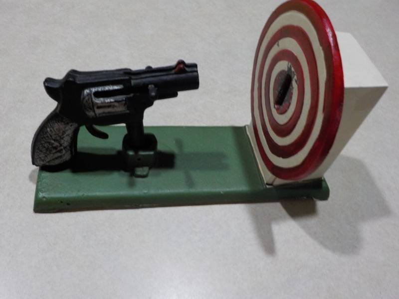 lot 3 image: Cast Iron Target Coin Practice Bit...