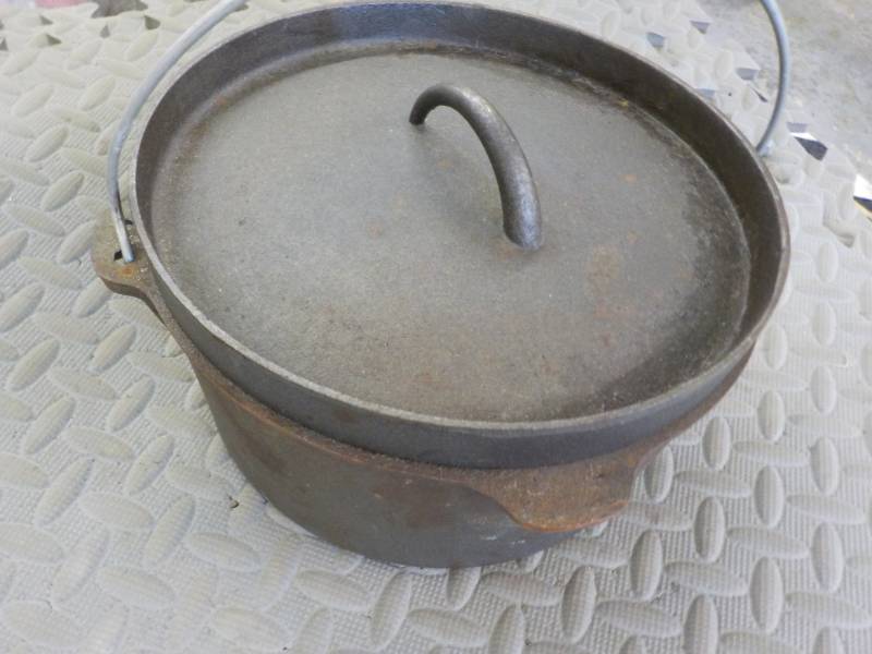 lot 98 image: Cast Iron Dutch Oven with Lid...