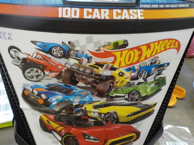 lot 141 image: 100 Hot Wheels case with 41 vehicle...