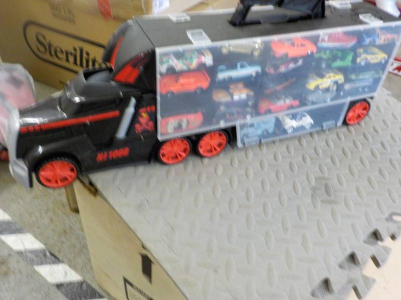 lot 149 image: Semi Hot Wheel Storage on both side...