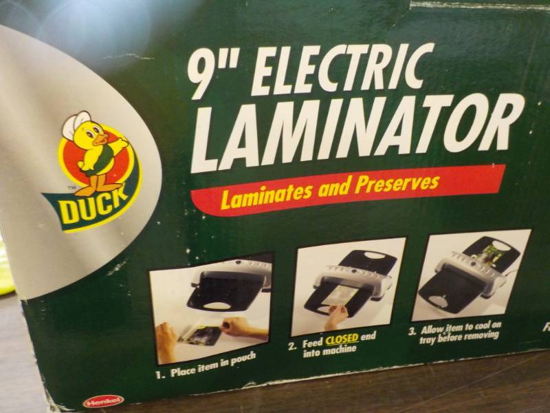 lot 164 image: 9 Electric Laminator looks unused...