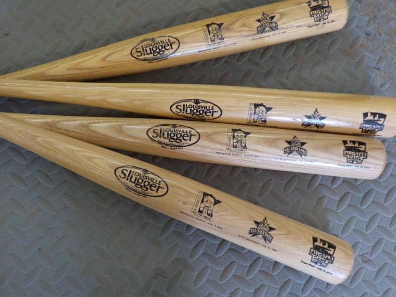 lot 229 image: 4 Wood Louisville Bats...
