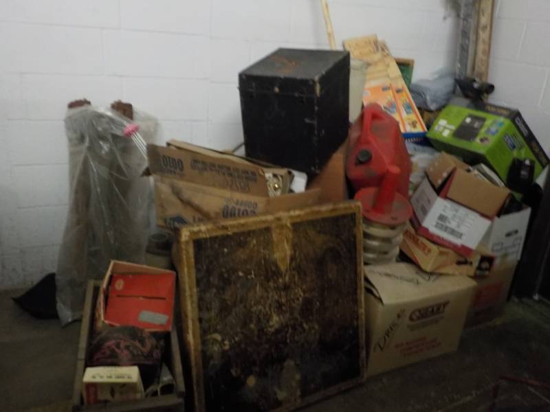 lot 370 image: Corner of unclaimed merchandise...
