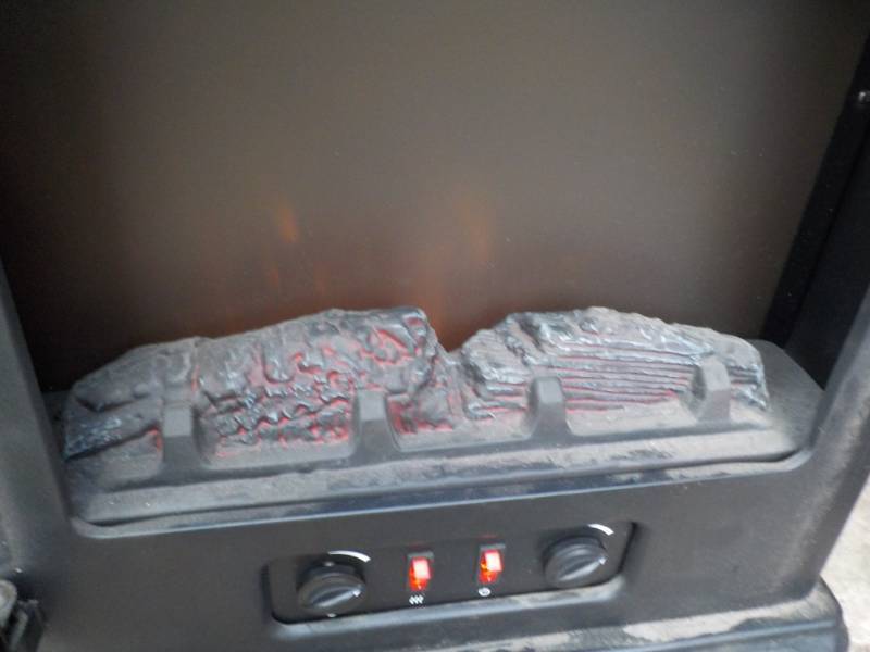 lot 397 image: Electric fireplace Powers on...