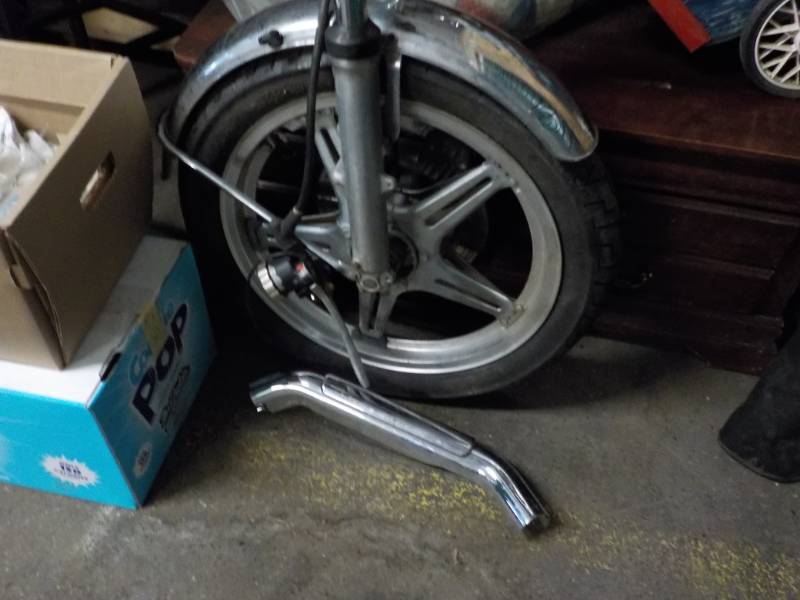 lot 401 image: Motorcycle Wheel and Chrome...