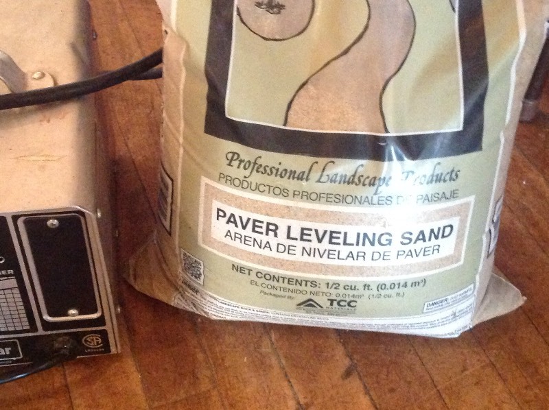 lot 174 image: Paver Leveling Sand & Golf Cart Charger