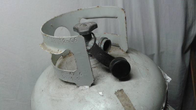 lot 101 image: 20 Pound Propane Gas Grilling Tank, More Then Half Filled
