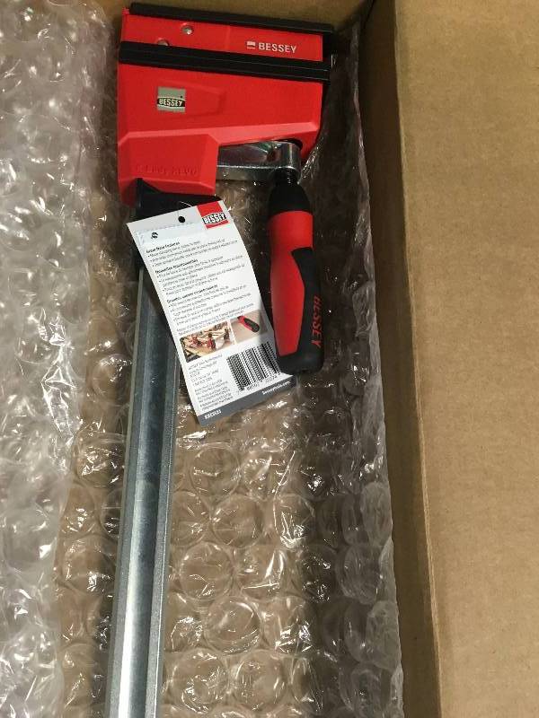 BESSEY 24 in. K Body REVOlution (KRE) Parallel Clamp with Composite Plastic Handle and 3-3 4 in. Throat Depth in good condition