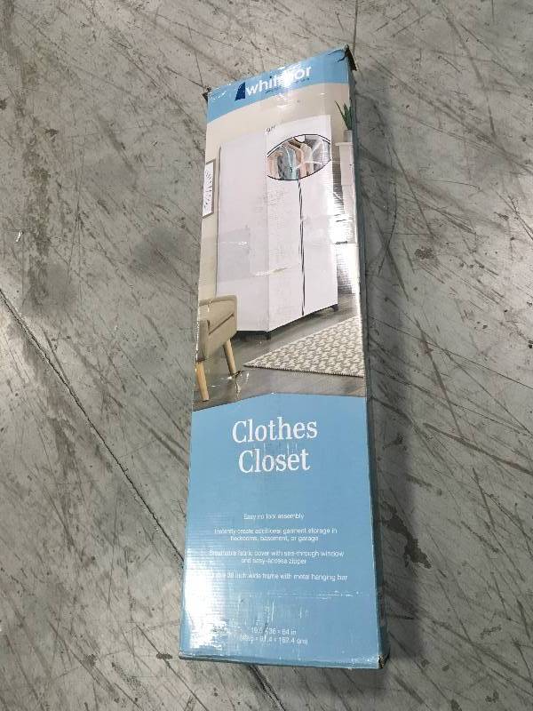 lot 14 image: Whitmor 36 in. Wide White Clothes Closet with Outer Cover in good condition