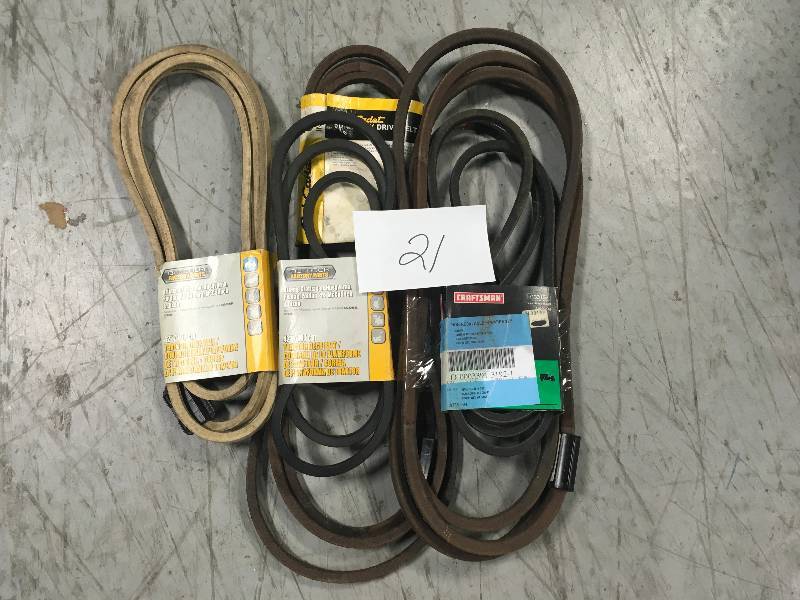lot 21 image: OUTDOOR TRACTOR DECK BELTS & MISC
