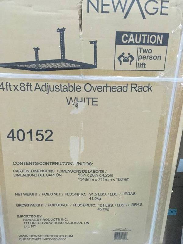 lot 62 image: Lot of 2 NewAge Products Performance 96 in. L x 48 in. W x 42 in. H Adjustable VersaRac Ceiling Storage Rack in White not used