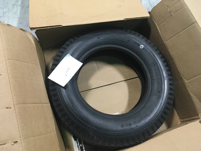 lot 64 image: Martin Wheel 530-12 Load Range C Trailer Tire in good condition