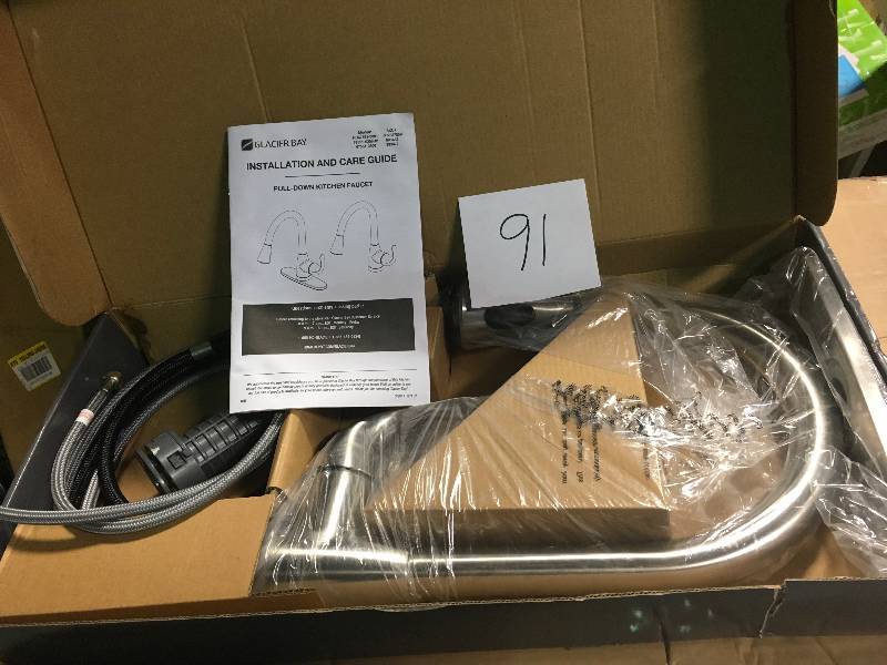 lot 91 image: Glacier Bay Market Single-Handle Pull-Down Kitchen Faucet with TurboSpray and FastMount in Stainless Steel in good condition