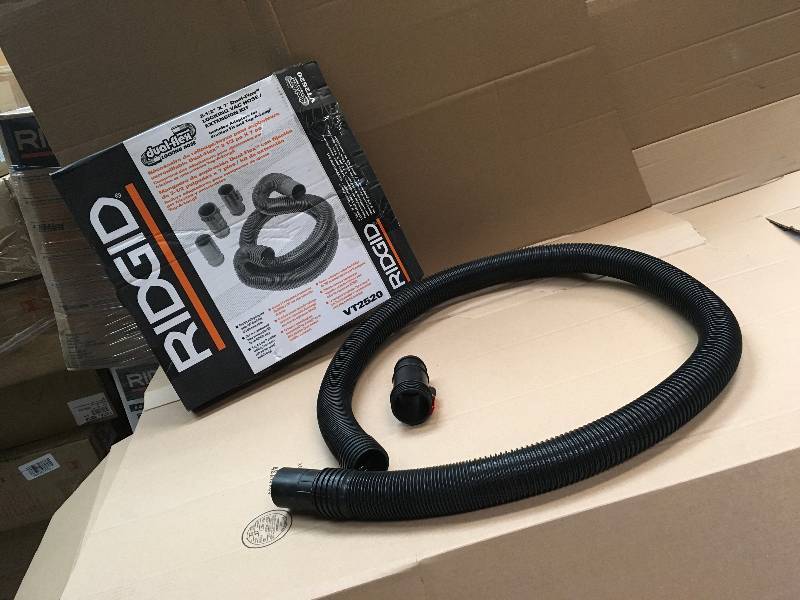 lot 1 image: RIDGID 2-12 in. x 7 ft. Tug-A-Long Vacuum Hose for RIDGID WetDry Vacs missing pcs not used in good condition