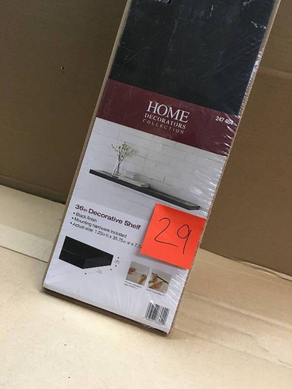 lot 29 image: Home Decorators Collection 36 in. L x 7.75 in. W Slim Floating Black Shelf not used